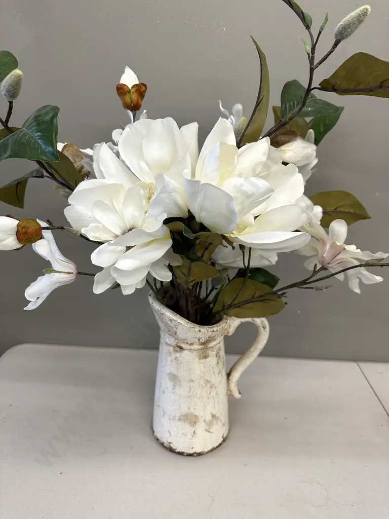 Faux Flowers In Decorative Jug Image 1++