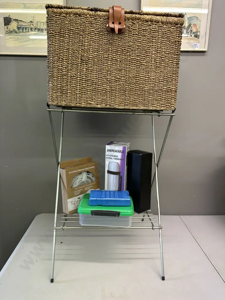 Wicker Basket With Assorted Picnic Items And Folding Metal Stand Image 1++