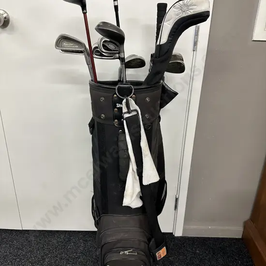 Assorted Golf Clubs In A Spalding Bag