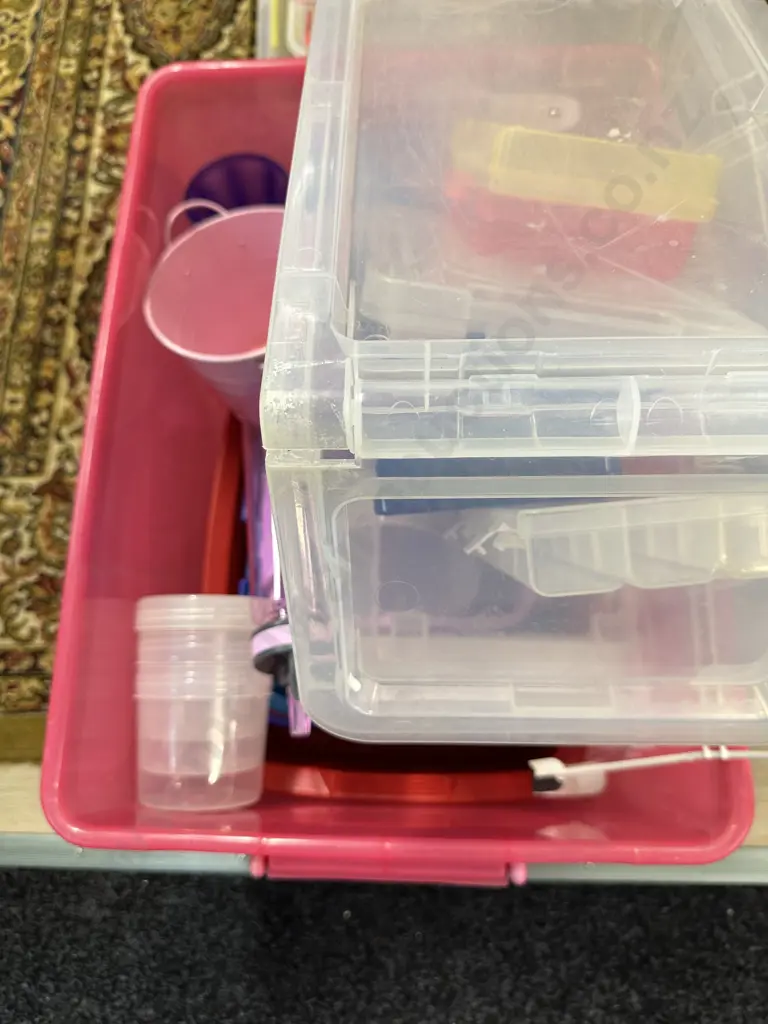 Assorted Plastic Ware In Pink Bin Image 1++