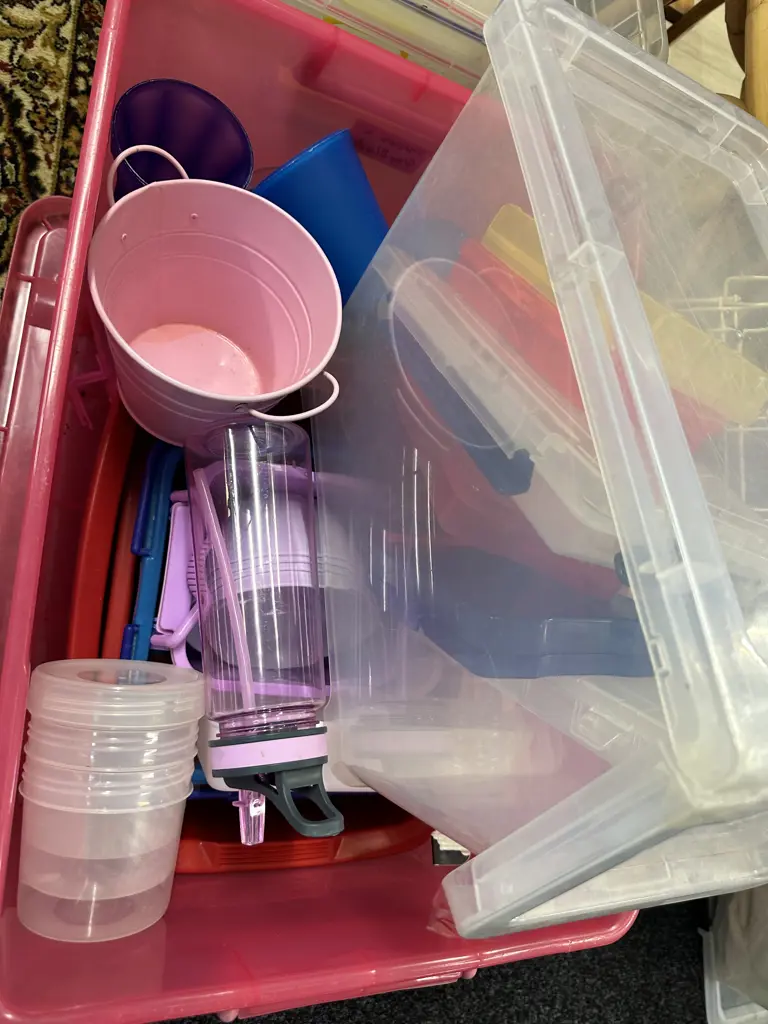 Assorted Plastic Ware In Pink Bin Image 1++