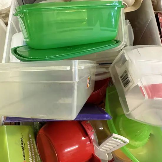 Clear Bin of Plasticware