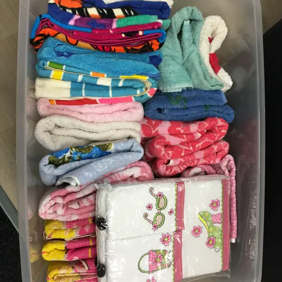 Clear Bin Of Assorted Towels 