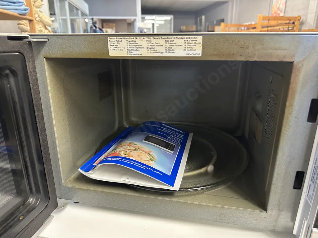 Panasonic Inverter The Genius 1100W Microwave With Manual, Model NN-ST67JS Image 1++