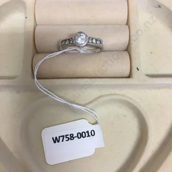 Silver Ring With Clear Stones Stamped 925 (Damaged)