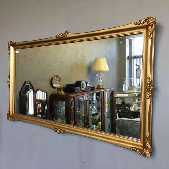 Gilt Framed Wall Mirror With Raised Scroll Work, 54 x 100cm