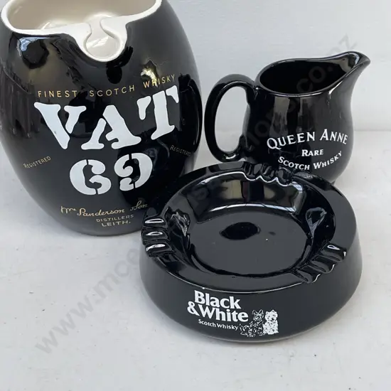 Three Vintage Wade Alcohol Advertsing Items: Vat69 Jug H15cm, Queen Anne Jug H8.5cm and Black and White Ashtray