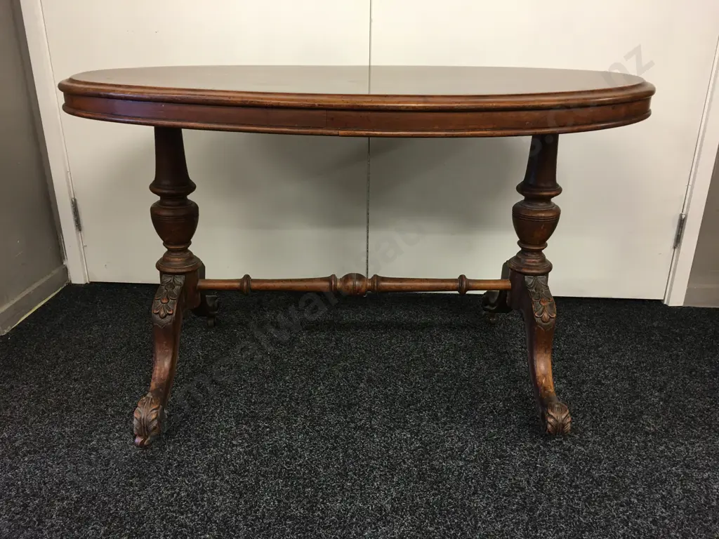 Antique Oval Kauri Centre Table, Carved Legs With Turned Shaped Stretcher, Bakelite Castors, H64 W106 D65cm Image 1++