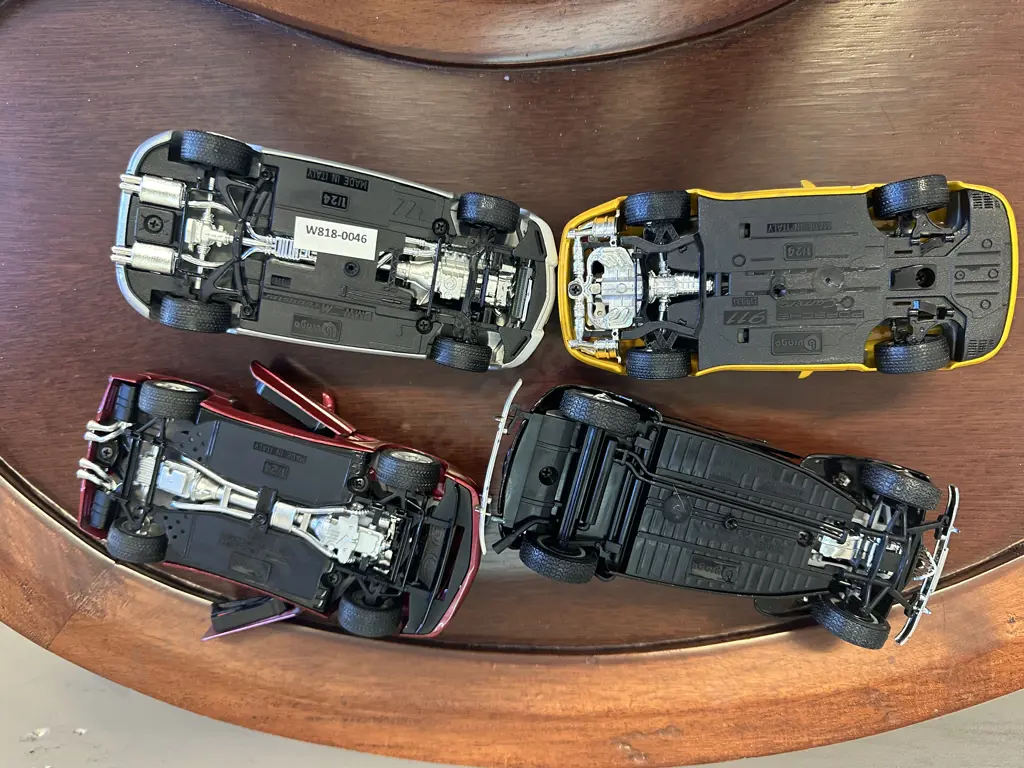 Lot of 4 Vintage Burago 1:24 Scale Diecast Model Cars Image 1++