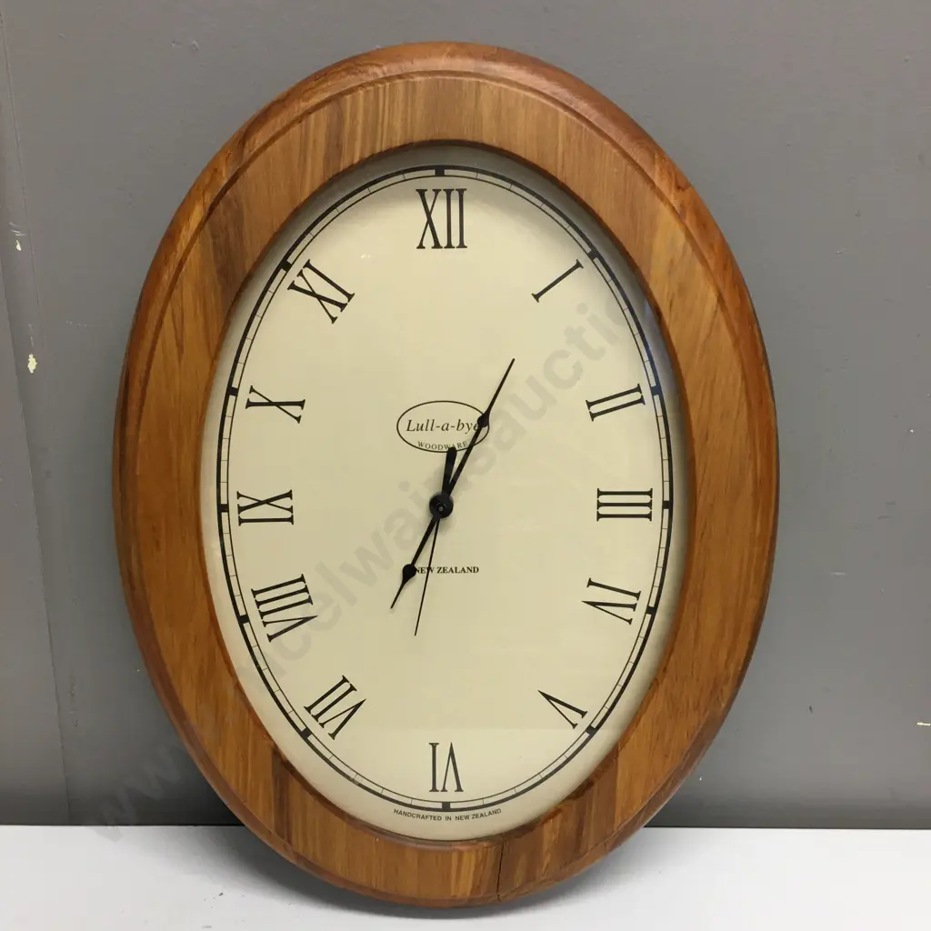 Oval Lull-a-bye Rimu Clock, 48 x 36cm Image 1++