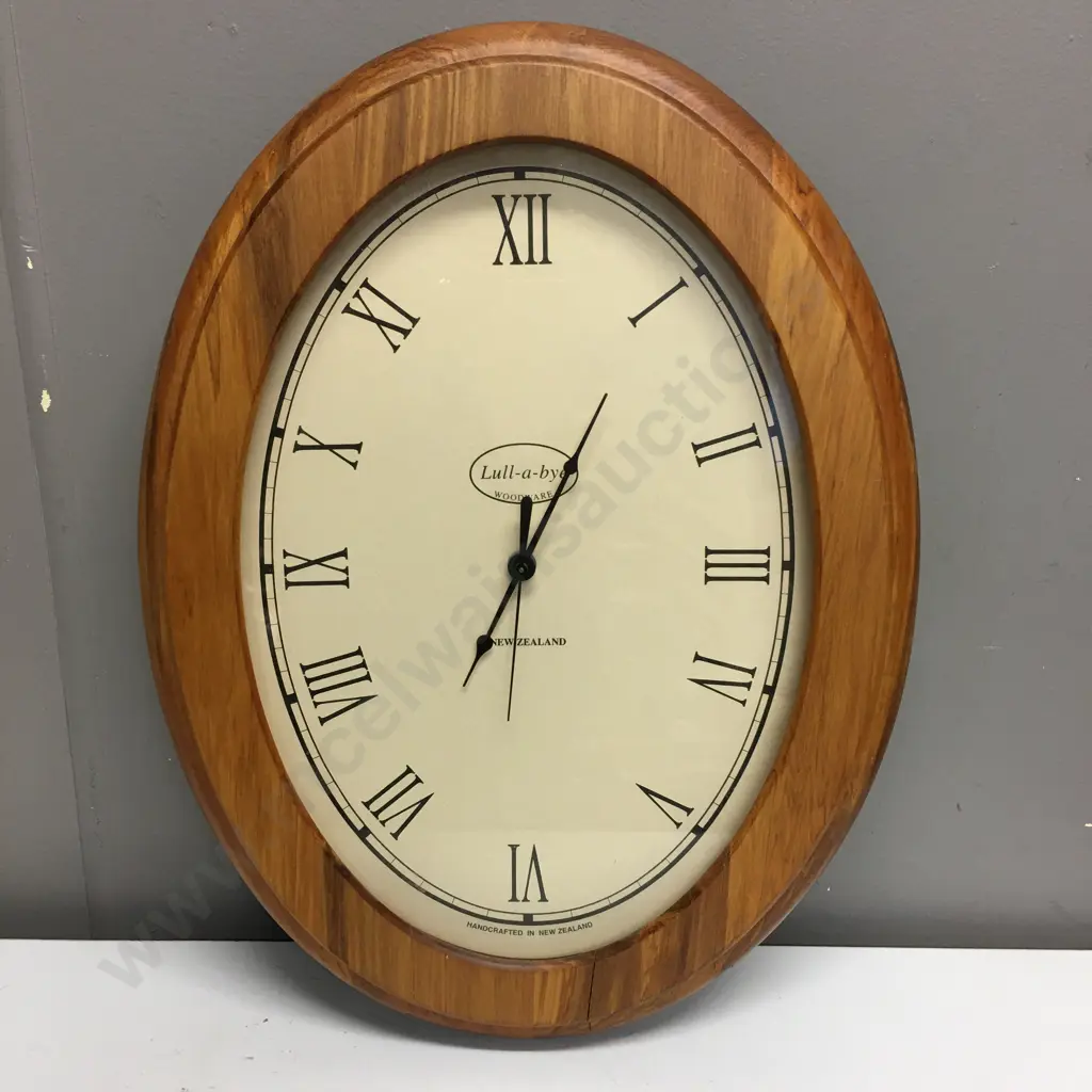 Oval Lull-a-bye Rimu Clock, 48 x 36cm Image 1++