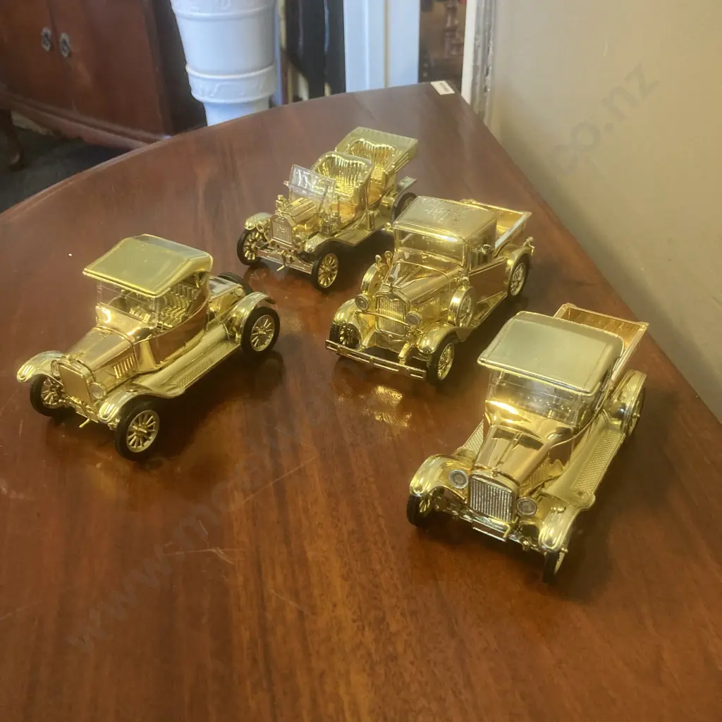 24K Gold Plated Models - 1925 Ford Model T Pickup, 1931 Ford Model A, 1925 Ford Model T & 1909 Ford Image 1++