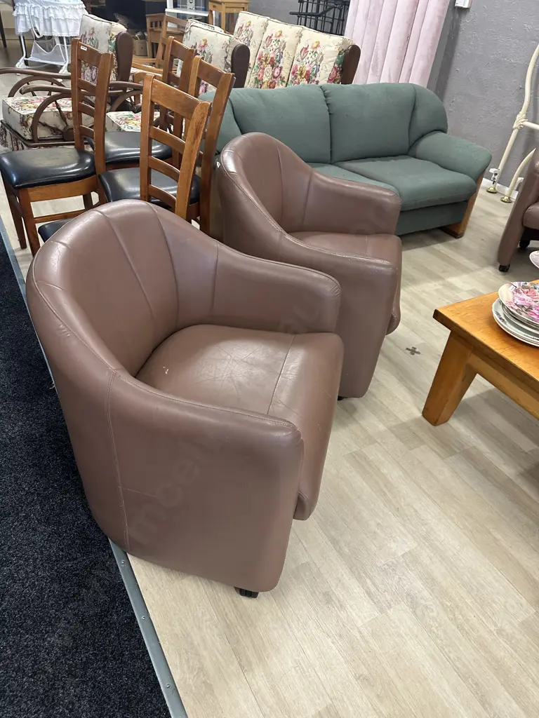 Pair of Brown Leather Tub Chairs On Castors Image 1++
