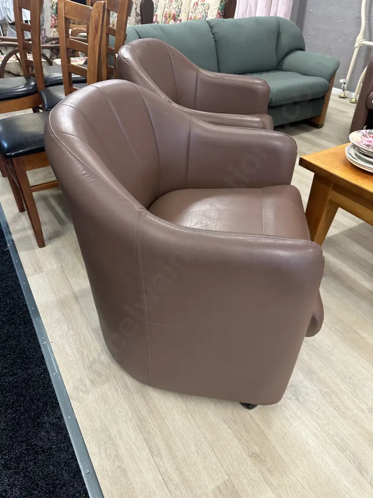 Pair of Brown Leather Tub Chairs On Castors Image 1++