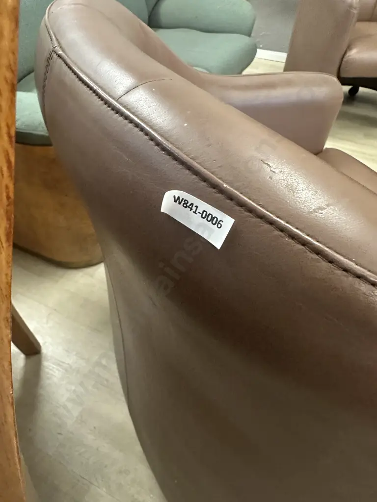 Pair of Brown Leather Tub Chairs On Castors Image 1++