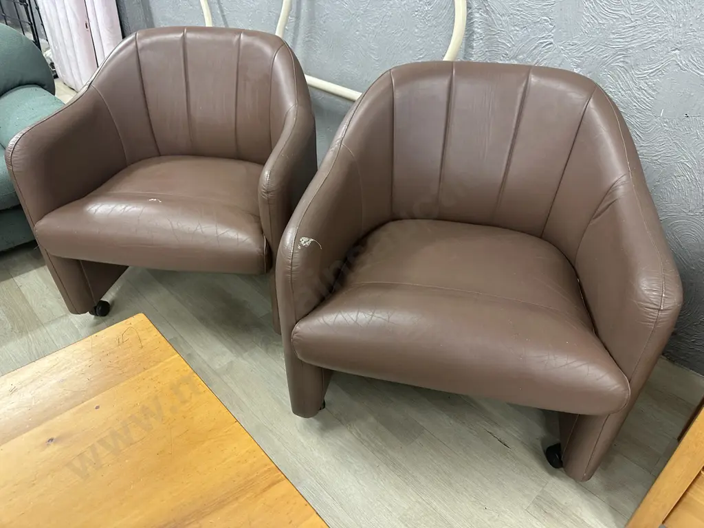 Pair of Brown Leather Tub Chairs On Castors Image 1++