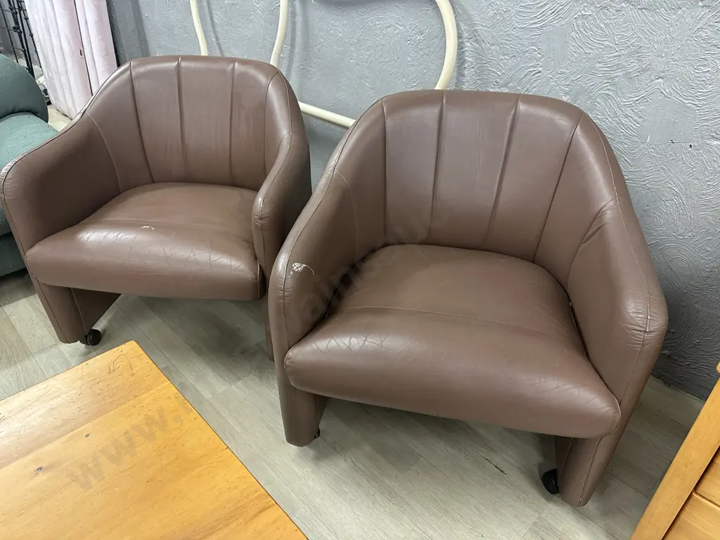 Pair of Brown Leather Tub Chairs On Castors Image 1++