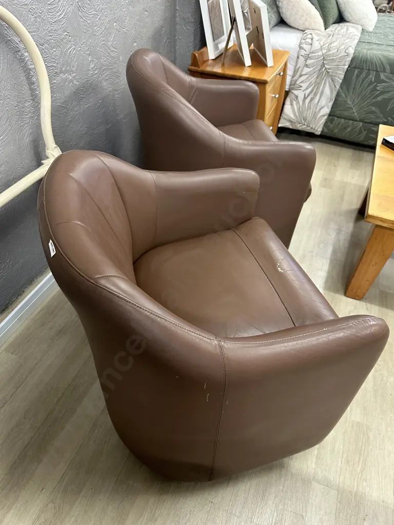Pair of Brown Leather Tub Chairs On Castors Image 1++