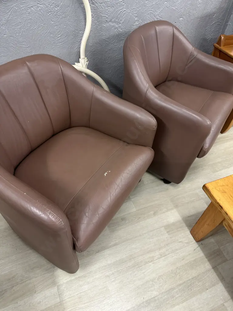 Pair of Brown Leather Tub Chairs On Castors Image 1++