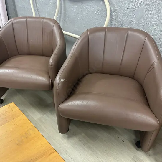 Pair of Brown Leather Tub Chairs On Castors
