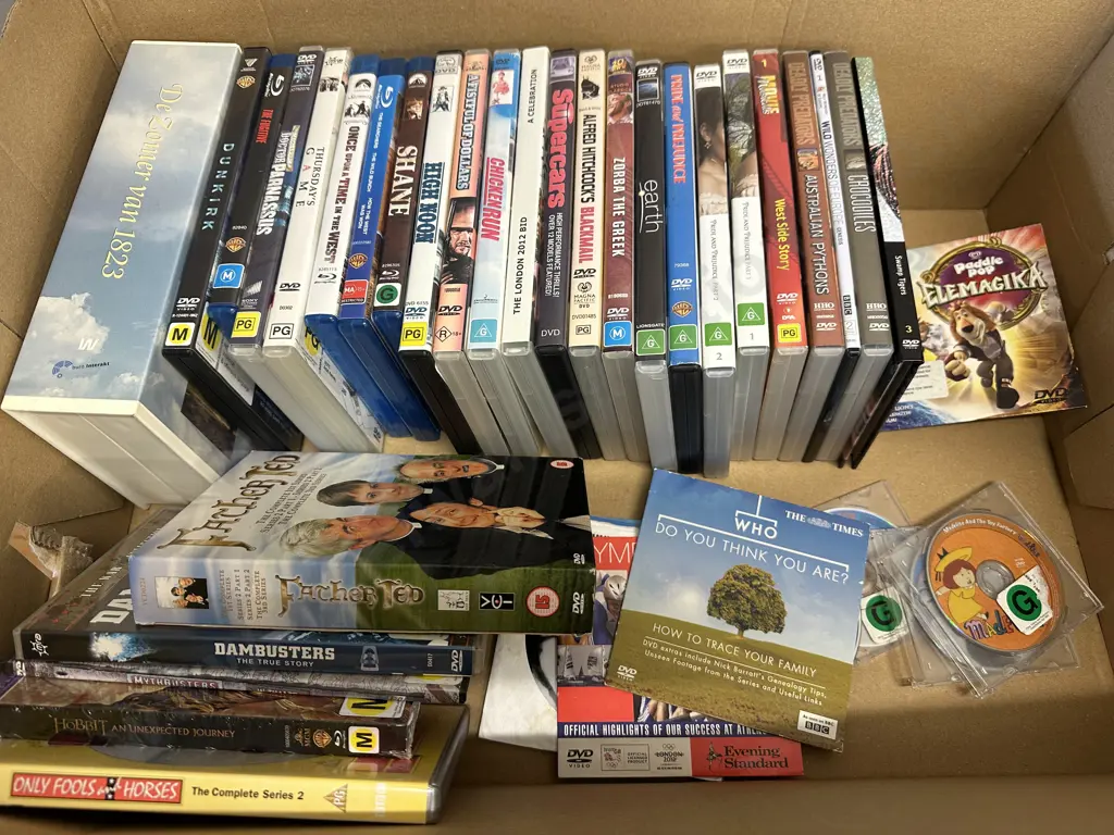 Box Of Assorted Dvds Etc Image 1++