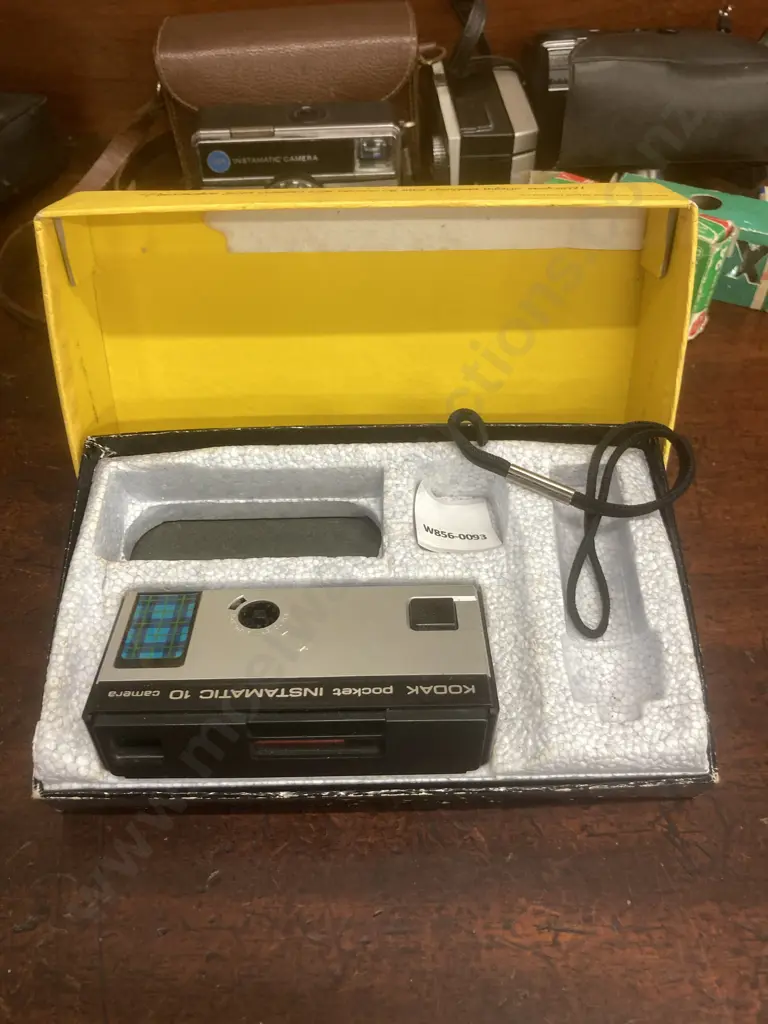 Vintage Kodak Pocket Instamatic 10 Camera Outfit with Original Box, Assorted Kodak Instamatics, Film & Flash Cubes Image 1++