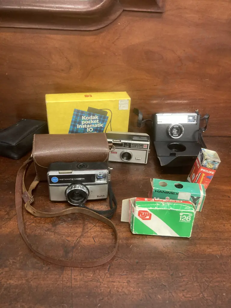 Vintage Kodak Pocket Instamatic 10 Camera Outfit with Original Box, Assorted Kodak Instamatics, Film & Flash Cubes Image 1++