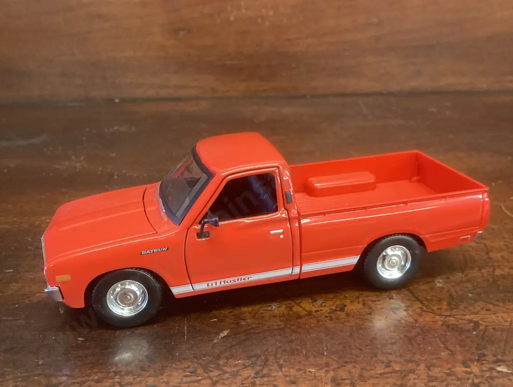 Maisto 1973 Datsun 620 Pickup, Red Collectors Edition 1:24 Diecast With Opening Doors Image 1++