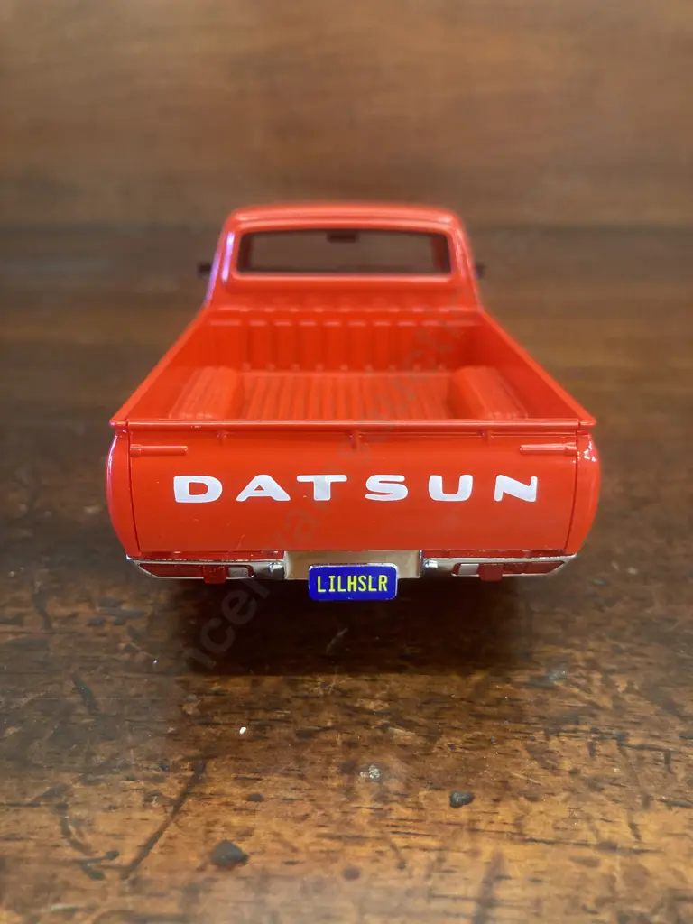 Maisto 1973 Datsun 620 Pickup, Red Collectors Edition 1:24 Diecast With Opening Doors Image 1++
