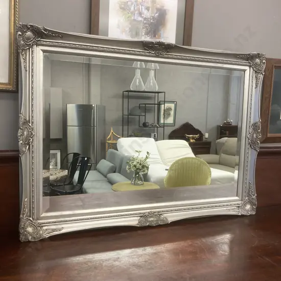 Vintage Bevelled Edge Wall Mirror With a Ornate Silver Painted Wooden Frame. 77 x 107cm