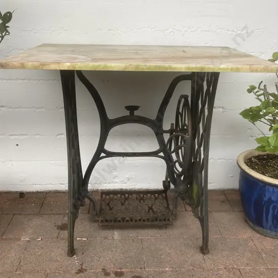 Marble Topped Console Table With a Cast Iron Treadle Sewing Machine Base. H74 W82 D58cm
