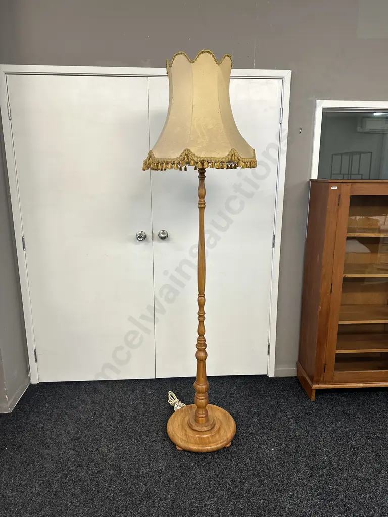 Turned Rimu Pedestal Lamp With a Gold Colour Tasselled Fabric Shade. H195cm Image 1++