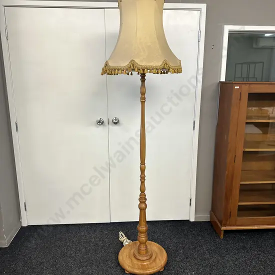 Turned Rimu Pedestal Lamp With a Gold Colour Tasselled Fabric Shade. H195cm