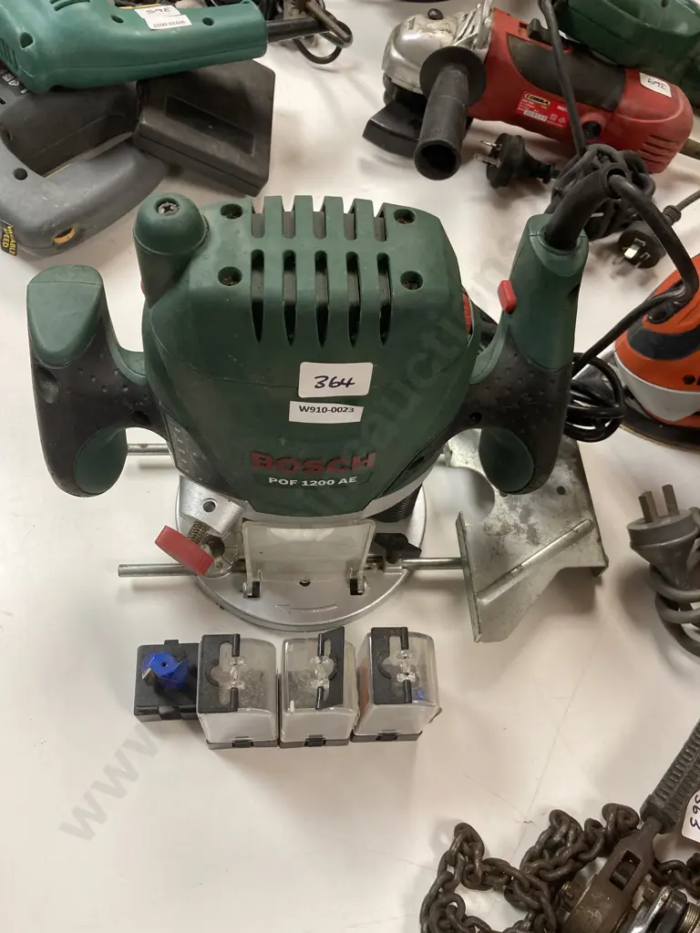 Bosch POF 1200 AE Router With 4 Extra Router Bits Image 1++