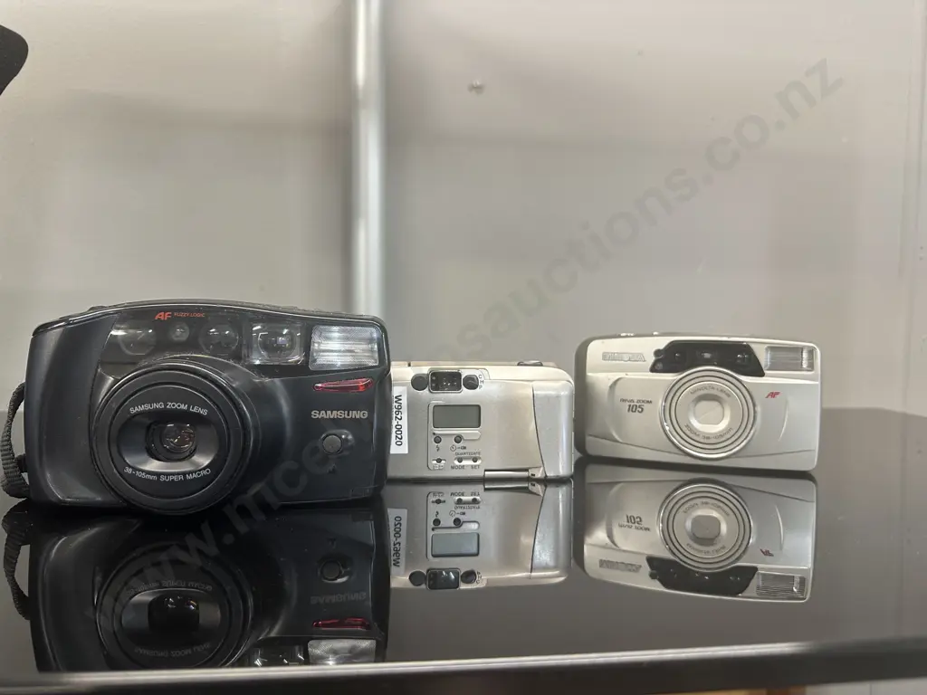 Olympus iZOOM 75 APS, Samsung AF Zoom 1050 & Minolta Riva Zoom 105 Compact Point & Shoot Film Cameras Image 1++