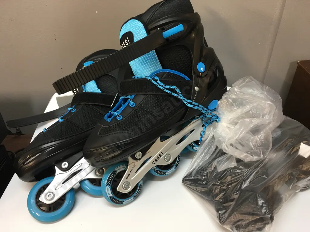 Pair Of Crest Roller Blades Black/Blue With Knee Pads Image 1++