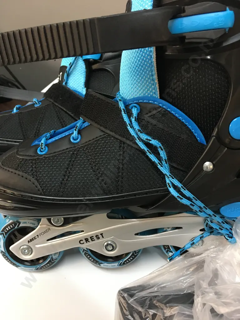 Pair Of Crest Roller Blades Black/Blue With Knee Pads Image 1++