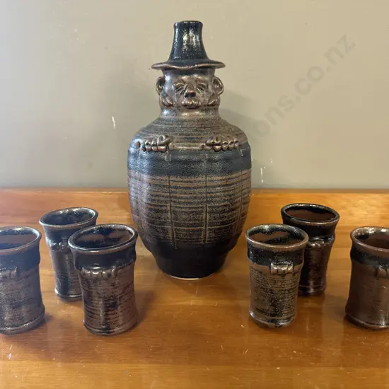 Vintage Pottery Decanter And Six Beakers  