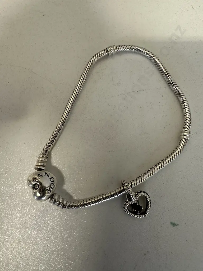 Pandora Charm Bracelet With a July Passionate Red Heart Hanging Charm Image 1++
