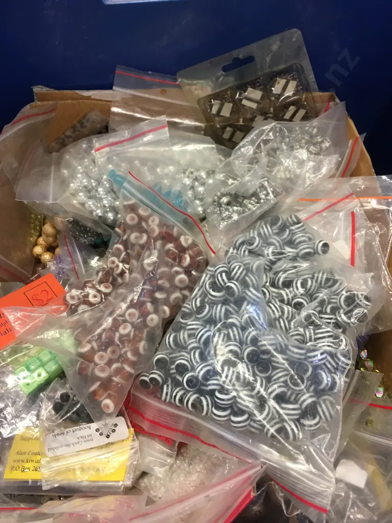   Large Selection Of Beads In Navy Blue Storage Bin Image 1++