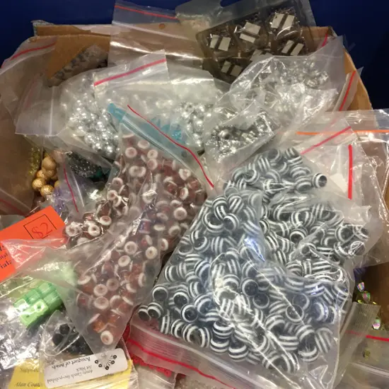   Large Selection Of Beads In Navy Blue Storage Bin