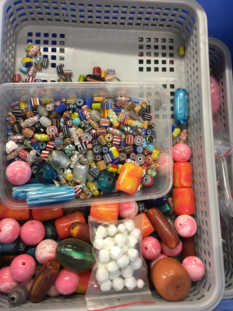 Large Selection Of Beads In Pale Blue Storage Bin Image 1++