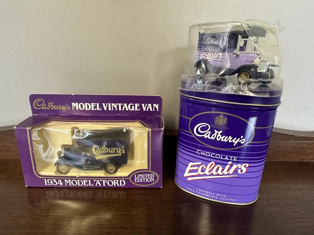 Lledo Vintage 90s Cadbury Chocolate Eclair Tin With Model, & Limited Edition Cadbury's 1934 Model 'A' Ford Image 1++