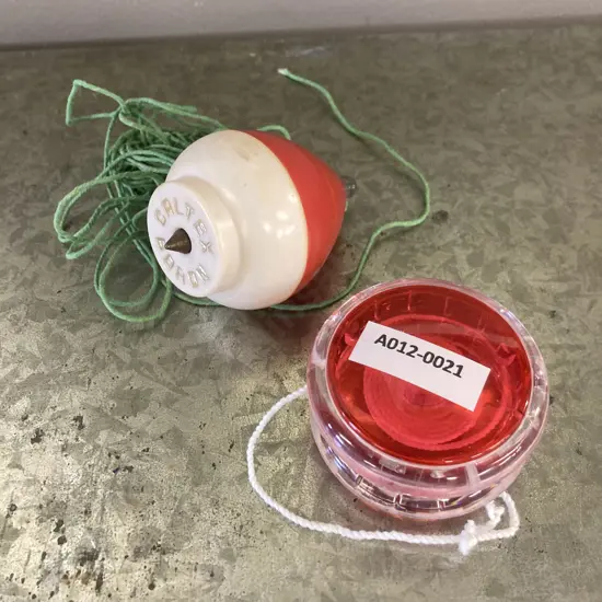 Vintage Caltex Boron Plastic Spinning Top With a Red & Clear Plastic Spinning Top