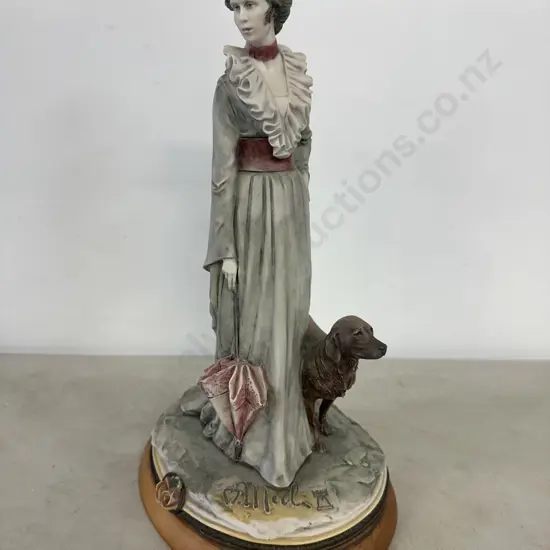 An Italian Bruno Merli Porcelain Figurine dating to 1981. H34cm