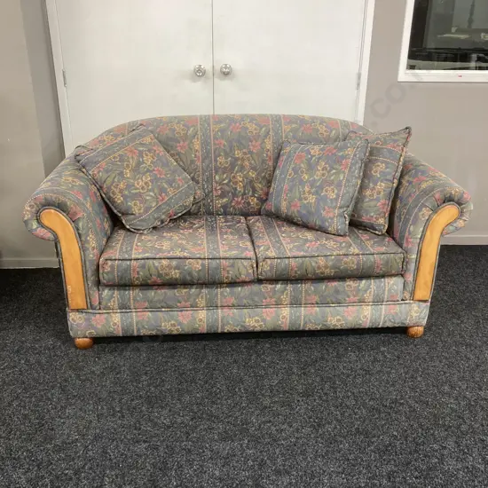 Floral Fabric Rolled Arm Couch With Bun Feet & Wood Panelling