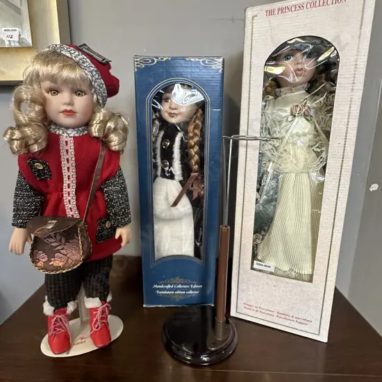 Porcelain Doll With Stand & Two Boxed Porcelain Dolls With a Stand