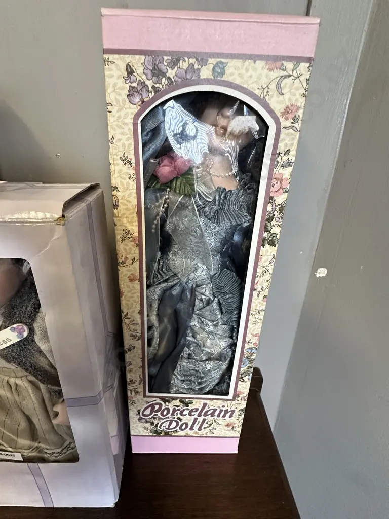 Three Boxed Porcelain Dolls With a Stand Image 1++