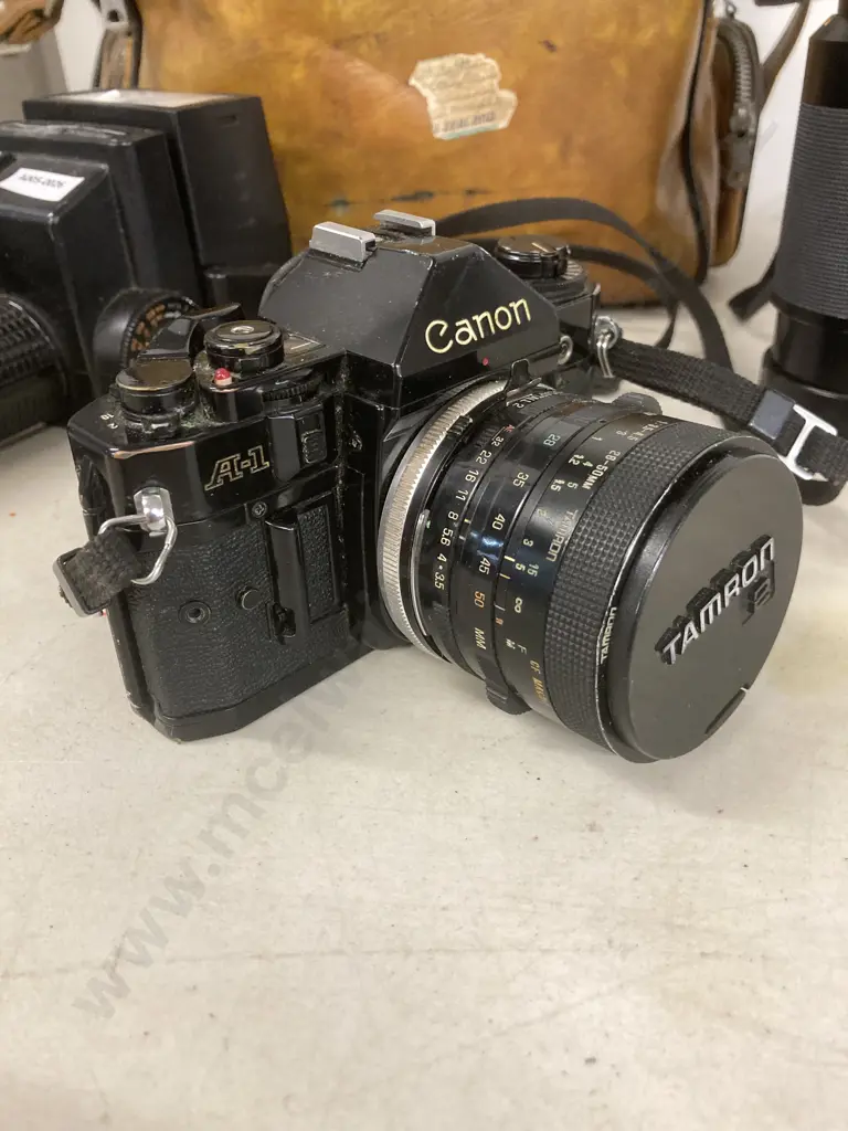 Canon A-1 35mm Film Camera, Tamron 28-50mm & 80-210mm Lenses, Sunpak Auto Zoom 3600 Thyristor Flash Etc Image 1++