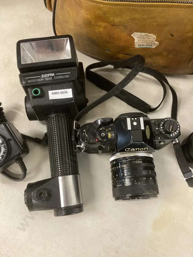 Canon A-1 35mm Film Camera, Tamron 28-50mm & 80-210mm Lenses, Sunpak Auto Zoom 3600 Thyristor Flash Etc Image 1++